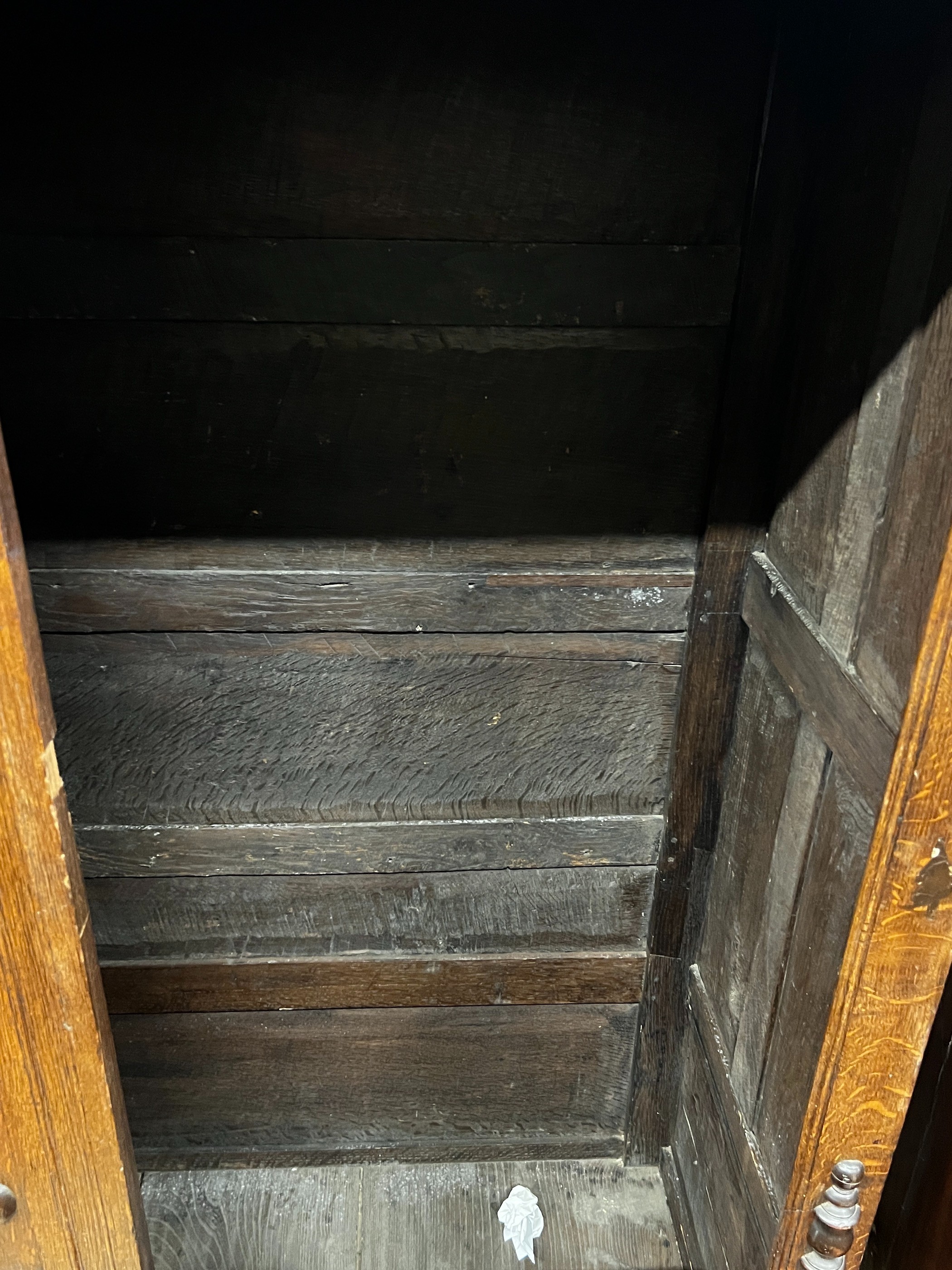 An 18th century style oak wardrobe, width 120cm, depth 51cm, height 168cm